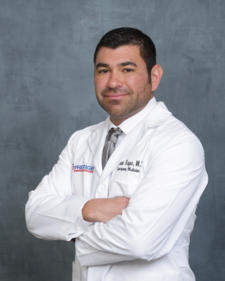 Adrian Reyes, MD