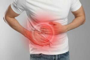 man suffering from appendicitis