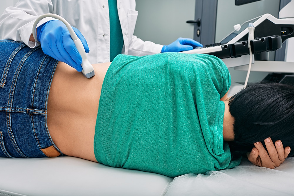 doctor scanning kidney
